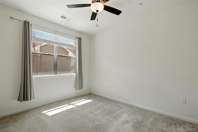 1881 S Dunkirk St Unit 106, Aurora, CO 80017 - spare room with visible vents, carpet flooring, baseboards, and a ceiling fan