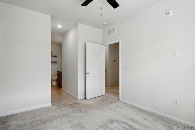 1881 S Dunkirk St Unit 106, Aurora, CO 80017 - unfurnished bedroom featuring recessed lighting, baseboards, visible vents, and light carpet