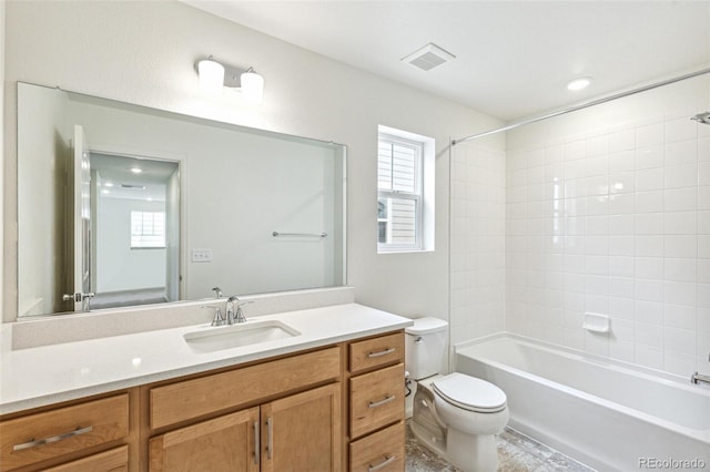 20724 E 57th Ave, Aurora, CO 80019 - full bath with toilet, vanity, and tub / shower combination