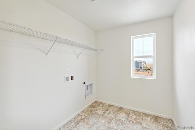 20724 E 57th Ave, Aurora, CO 80019 - washroom featuring hookup for an electric dryer, washer hookup, and baseboards