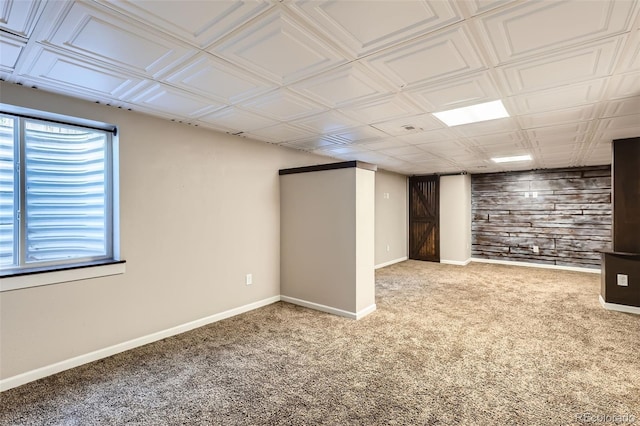 13018 Niagara Way, Thornton, CO 80602 - below grade area with carpet and wood walls