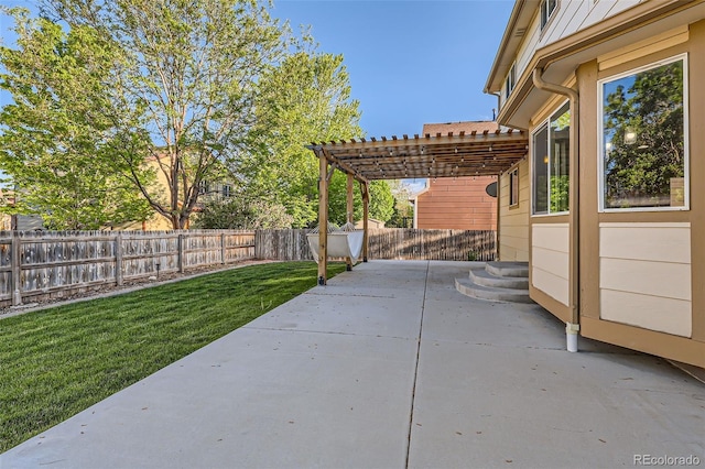 13018 Niagara Way, Thornton, CO 80602 - fenced backyard with a pergola and a patio area