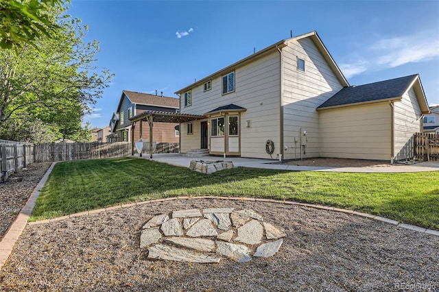 13018 Niagara Way, Thornton, CO 80602 - rear view of house featuring a patio and a fenced backyard