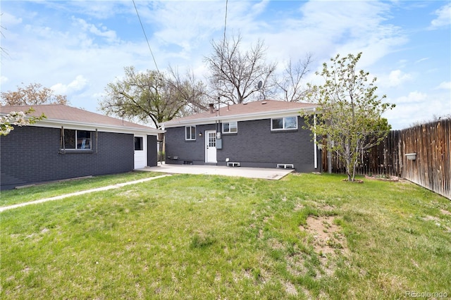 10752 Blue Jay Ln, Northglenn, CO 80233 - back of house with a patio area and brick siding