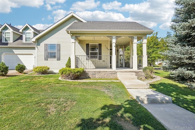 view of front facade featuring a garage, a front yard, and covered porch