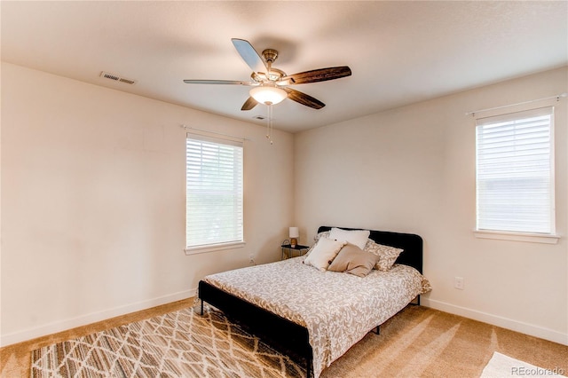8107 Arapahoe Peak St, Littleton, CO 80125 - bedroom featuring light colored carpet and ceiling fan