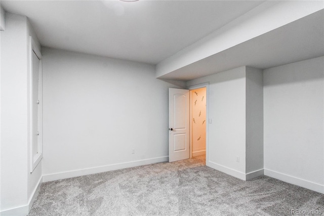 8107 Arapahoe Peak St, Littleton, CO 80125 - below grade area featuring carpet and baseboards