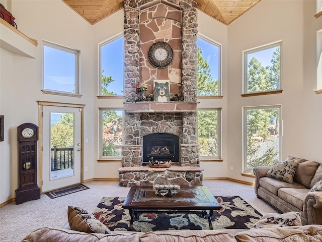 living room featuring wood ceiling and high vaulted ceiling