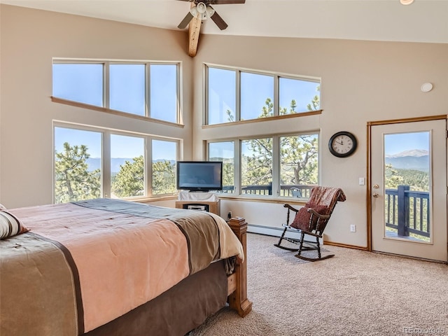 bedroom with a high ceiling, a baseboard radiator, carpet, and access to exterior