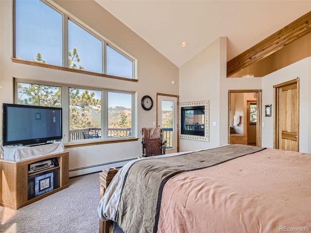 carpeted bedroom featuring a baseboard radiator and high vaulted ceiling