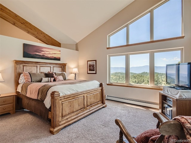 carpeted bedroom featuring a baseboard radiator and high vaulted ceiling