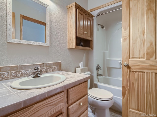 full bathroom featuring shower / bath combination, vanity, and toilet