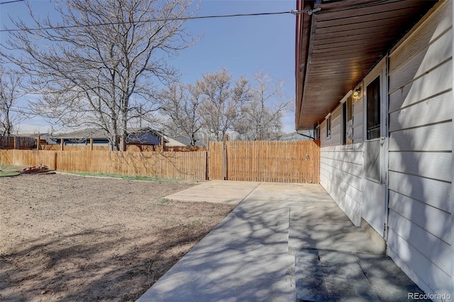 view of yard featuring a patio area and fence