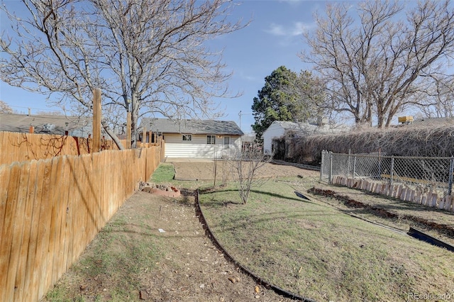 view of yard featuring fence