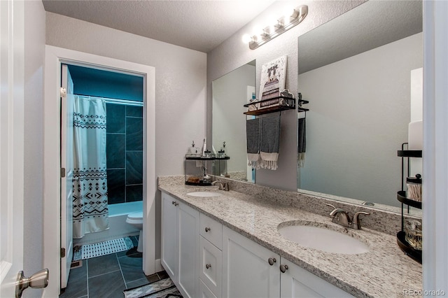 bathroom featuring toilet, shower / bath combination with curtain, double vanity, and a sink