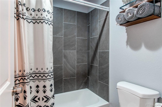 bathroom with shower / bath combination with curtain and toilet