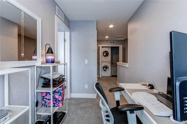 office with recessed lighting, visible vents, baseboards, carpet, and stacked washer and clothes dryer