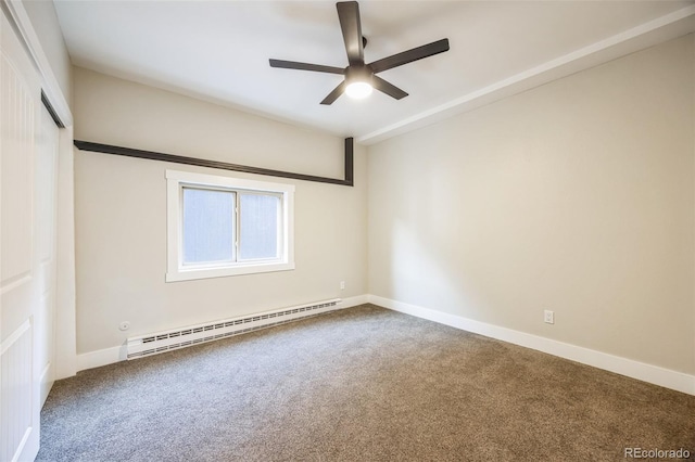 empty room featuring baseboard heating, ceiling fan, and carpet floors