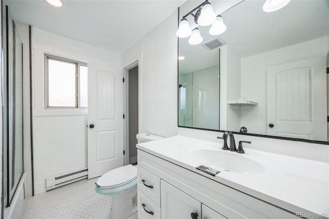 bathroom featuring a baseboard radiator, vanity, toilet, and tile patterned flooring