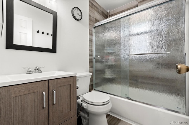 741 Cortez St, Denver, CO 80221 - full bathroom featuring toilet, combined bath / shower with glass door, and vanity