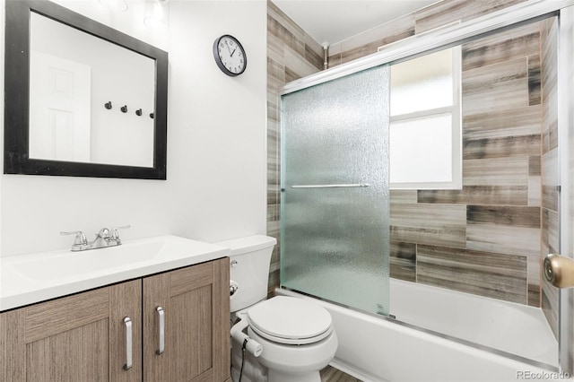 741 Cortez St, Denver, CO 80221 - full bathroom featuring toilet, vanity, and enclosed tub / shower combo