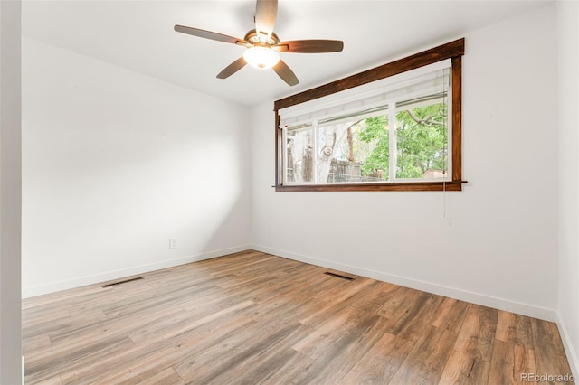 741 Cortez St, Denver, CO 80221 - empty room featuring wood finished floors, baseboards, and ceiling fan