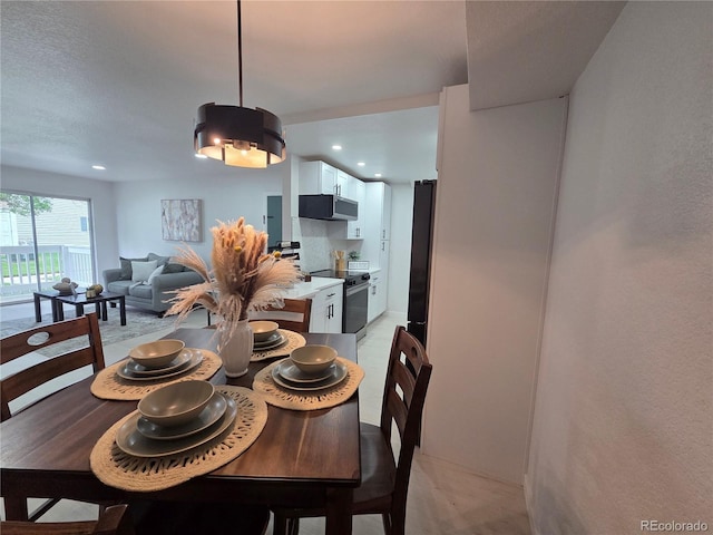 14433 E Jewell Ave Unit 101, Aurora, CO 80012 - dining room with recessed lighting