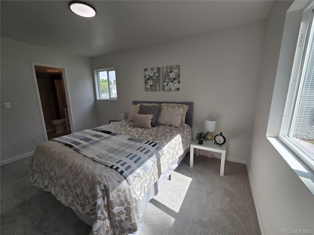 14433 E Jewell Ave Unit 101, Aurora, CO 80012 - bedroom featuring carpet floors and ensuite bathroom
