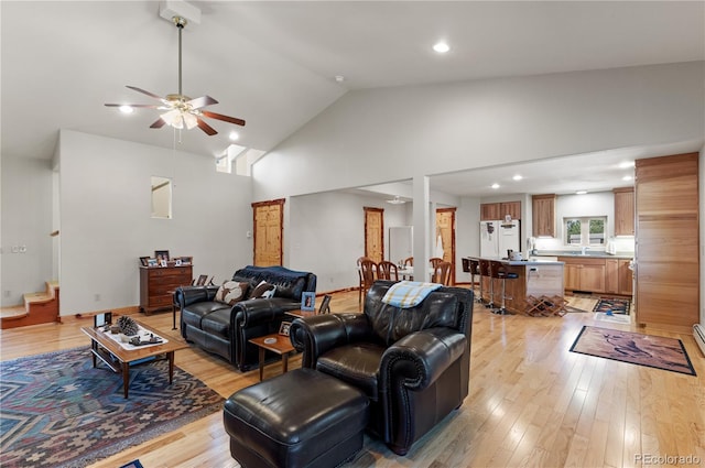 33002 Bobcat Ct, Trinidad, CO 81082 - living room featuring a ceiling fan, high vaulted ceiling, light wood-style floors, and recessed lighting