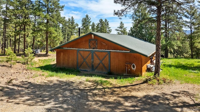 33002 Bobcat Ct, Trinidad, CO 81082 - view of outbuilding featuring a forest view