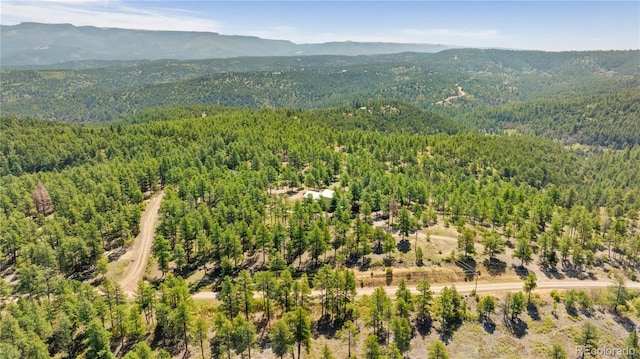 33002 Bobcat Ct, Trinidad, CO 81082 - bird's eye view of a heavily wooded area and a mountainous background