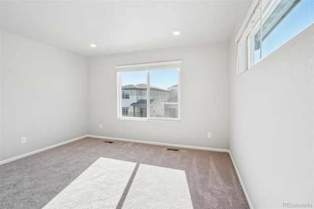 view of carpeted spare room