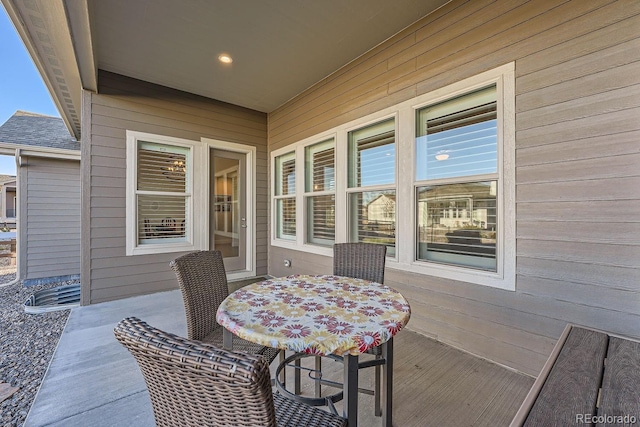 8778 S Quatar St, Aurora, CO 80016 - wooden terrace with outdoor dining area
