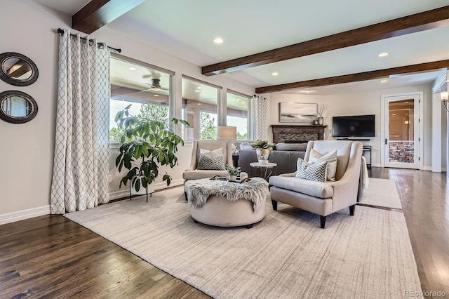 9453 Vista Hill Ln, Lone Tree, CO 80124 - living area with wood finished floors, beam ceiling, and recessed lighting