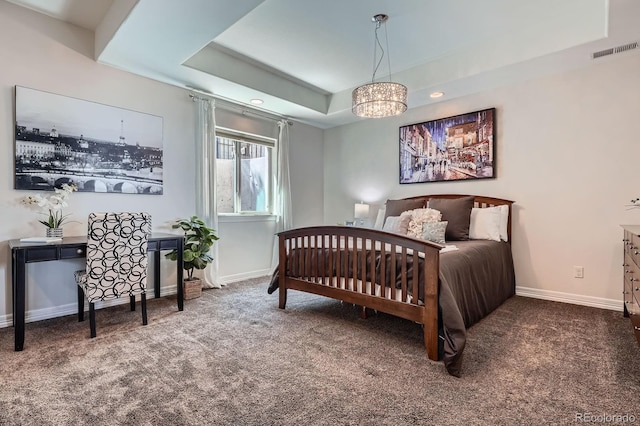 9453 Vista Hill Ln, Lone Tree, CO 80124 - carpeted bedroom featuring a chandelier, a tray ceiling, and recessed lighting