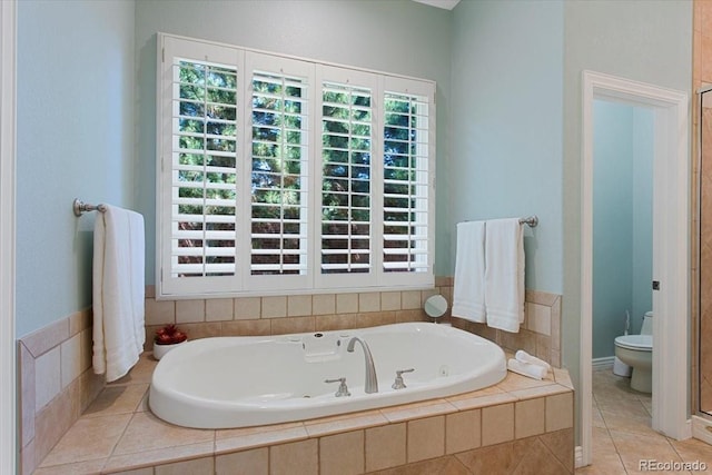 6703 S Yates Ct, Littleton, CO 80128 - bathroom with a jetted tub and tile patterned flooring