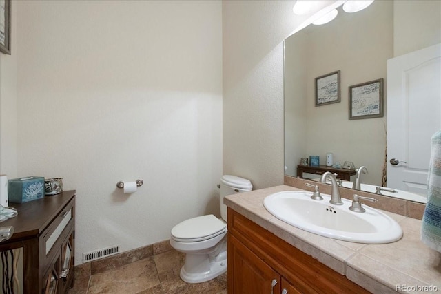 6703 S Yates Ct, Littleton, CO 80128 - bathroom with toilet and vanity