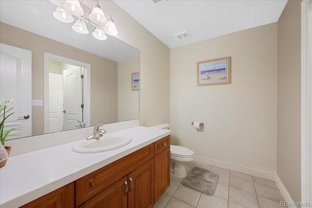 6703 S Yates Ct, Littleton, CO 80128 - bathroom featuring vanity, tile patterned floors, and a chandelier