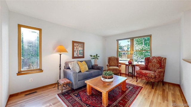 14633 W 69th Pl, Arvada, CO 80004 - living area featuring light wood-style flooring