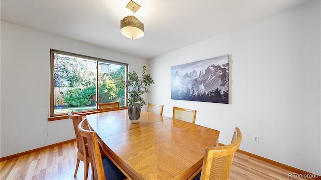 14633 W 69th Pl, Arvada, CO 80004 - dining space with light wood finished floors