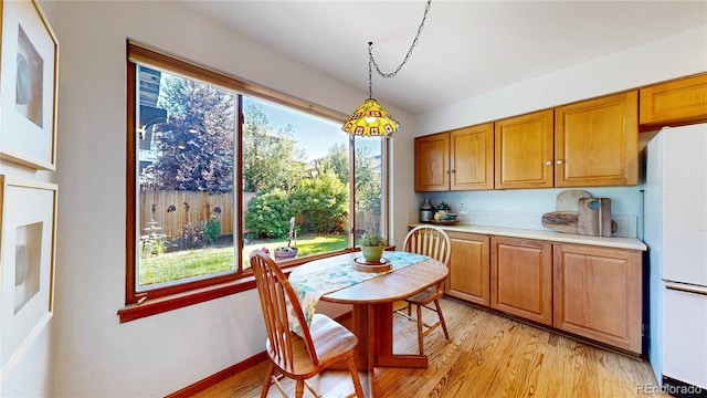 14633 W 69th Pl, Arvada, CO 80004 - dining room with light wood finished floors