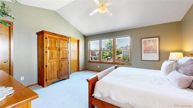 14633 W 69th Pl, Arvada, CO 80004 - bedroom with light colored carpet, lofted ceiling, and ceiling fan