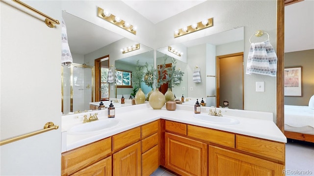14633 W 69th Pl, Arvada, CO 80004 - bathroom featuring double vanity, a shower stall, and ensuite bathroom