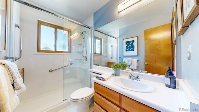 14633 W 69th Pl, Arvada, CO 80004 - full bathroom featuring vanity and a shower stall