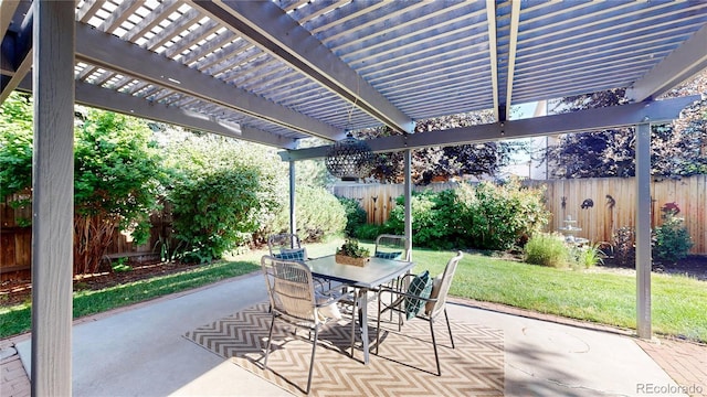 14633 W 69th Pl, Arvada, CO 80004 - fenced backyard featuring outdoor dining space, a patio, and a pergola