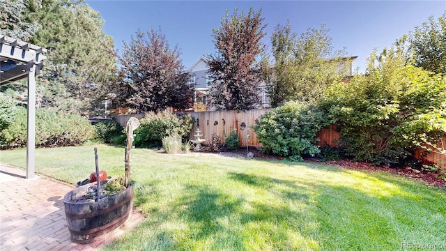 14633 W 69th Pl, Arvada, CO 80004 - fenced backyard with a patio