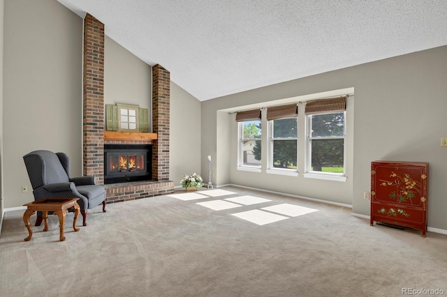 7466 E Long Cir, Centennial, CO 80112 - living room featuring a fireplace, carpet, baseboards, a textured ceiling, and high vaulted ceiling
