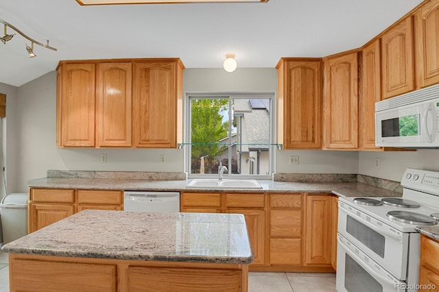 7466 E Long Cir, Centennial, CO 80112 - kitchen with white appliances, a sink, light tile patterned floors, and light stone countertops