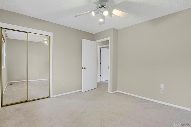 7466 E Long Cir, Centennial, CO 80112 - unfurnished bedroom featuring carpet, baseboards, a ceiling fan, and a closet