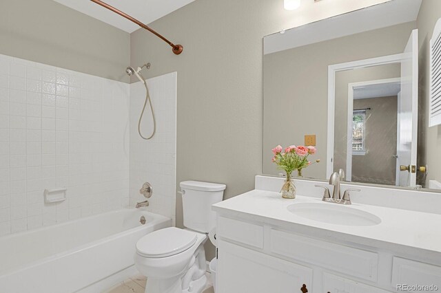 7466 E Long Cir, Centennial, CO 80112 - bathroom with toilet, vanity, and shower / tub combination